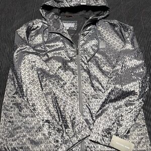 Michael Kors Hooded Windbreaker
Jacket with Logo Print SIZE LARGE WITH TAG!